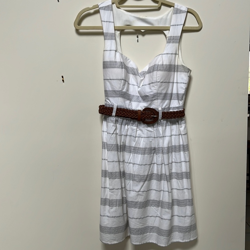 White sundress with cute heart shape cutout in the back and all sizes brown belt
